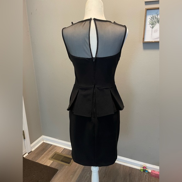 Black peplum dress - Picture 2 of 5